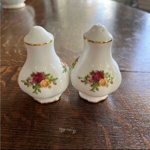 Royal Albert old country roses brand new never used salt and pepper shakers.